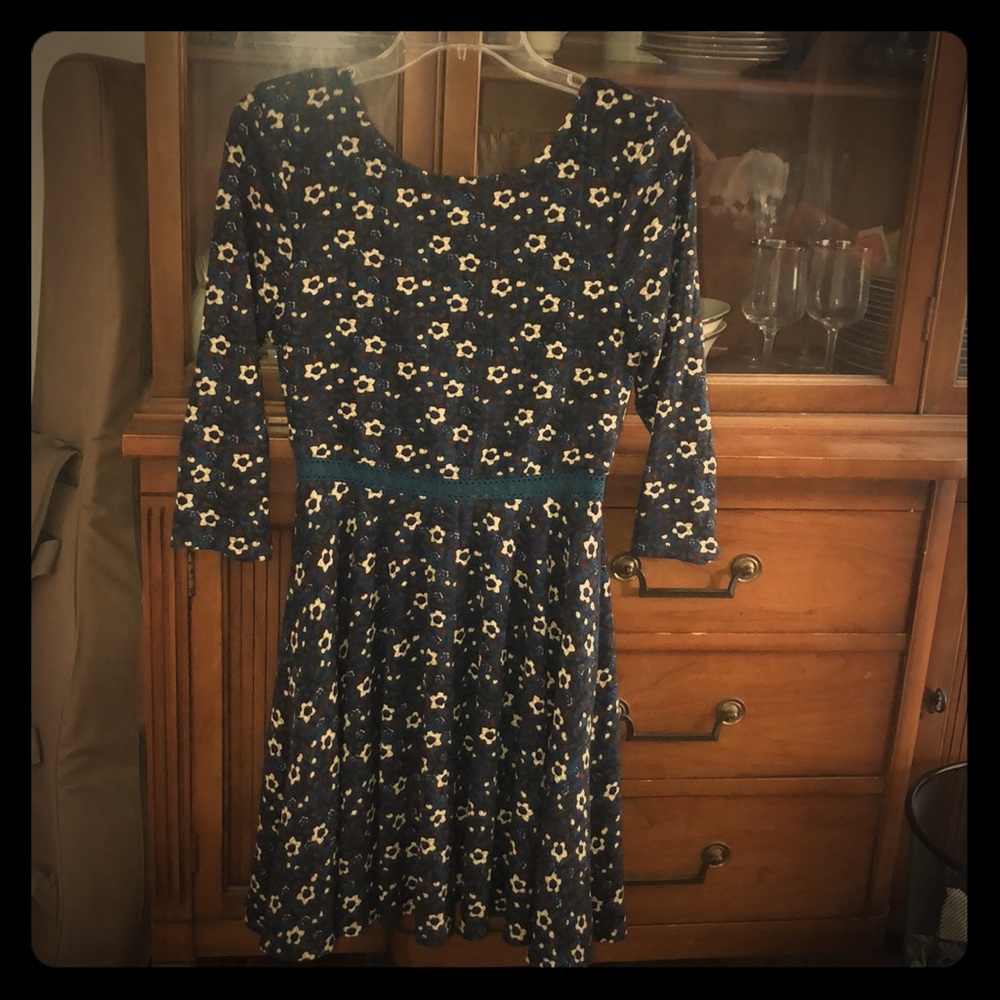 A long sleeve teal Francesca’s dress